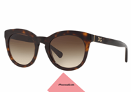 Sunglasses Dolce & Gabbana DG 4249 col.502 / 13 with a rounded shape. Glasses celluloid havana brown with gold DG logo on the temples. A complete, lenses in brown gradient. Treat yourself to a touch of understated style, buy this glamorous eyewear Dolce & Gabbana 4249.