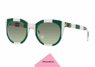 Sunglasses Dolce & Gabbana DG 4249 col.30268E from simple, rounded form. Celluloid glasses of white and green lines with green gradient lenses. Accessory that evokes an earlier era but stylized in a modern way. Gold DG logo on the temples.