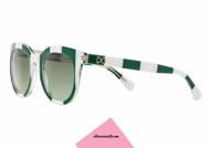 Sunglasses Dolce & Gabbana DG 4249 col.30268E from simple, rounded form. Celluloid glasses of white and green lines with green gradient lenses. Accessory that evokes an earlier era but stylized in a modern way. Gold DG logo on the temples.