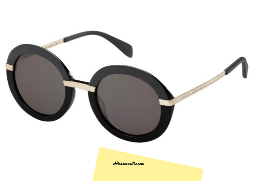 Sunglasses Marc by Marc Jacobs MMJ 490 col. RHPNR with front glossy black celluloid rods and contrasting silver metal bridge. Sunglasses from the round shape in perfect hippie / bohemian style. Buy this eyewear Marc by Marc, takes advantage of the free shipping in Italy and the discounted price.