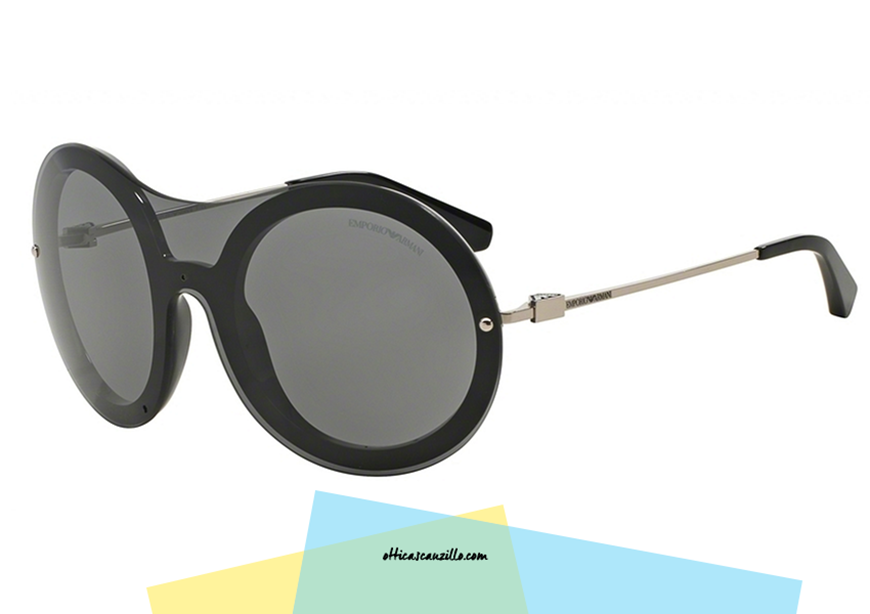 Sunglasses Emporio Armani EA 4055 col. 501787 futuristic. Glasses of Armani fashion show in black celluloid with metal rods. Effect 'boo' thanks to the oversized mask. Purchase this sunglasses Emporio Armani EA 4055, give yourself a feminine design accessory and a strong aesthetic impact.