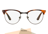 New Collection New Icons glasses Persol PO8129 col.108 the classic round shape with frame in havana colored coffee only at the top. Eyewear with a contemporary design thanks to the metal bridge. Eyewear Persol New New Icons collection. Buy Persol eyewear at discounted price