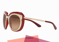 New eyewear collection sunglasses Dolce & Gabbana DG6104 col. 304413 contemporary and sophisticated style. Glasses with gold metal frame and front with celluloid in contrasting burgundy. Classic soul and even researched thanks to the lenses in brown gradient that complete eyewear design. Female accessory of the new Dolce & Gabbana sunglasses.