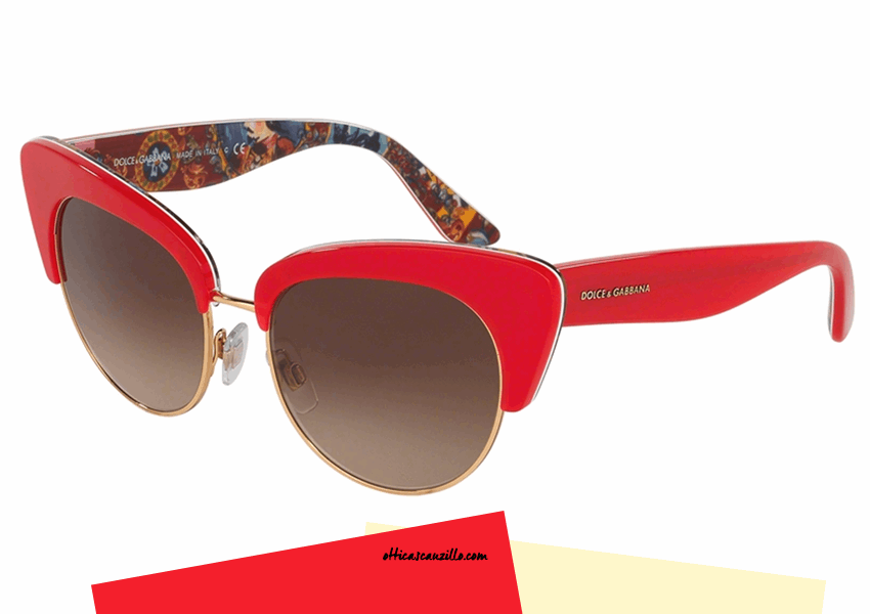 New eyewear collection sunglasses Dolce & Gabbana DG4277 col. 303413 Edition Sicilian Carretto with frame in red celluloid and alternating gold metal. Glasses with multicolor interior with typical Sicilian press. Lenses in brown gradient. Buy this Dolce & Gabbana sunglasses DG4277, give yourself a unique accessory that makes the difference.