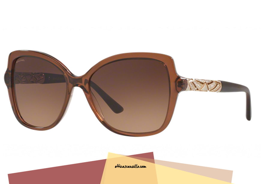New eyewear collection sunglasses Bulgari BV 8174B col. 540113 female-shaped butterfly. Glasses celluloid transparent brown embellished with gold and stones on auctions. A complete, shaded brown lenses. elegant and sensual eyewear that fits perfectly with an adult style. Give yourself a jewel for your face, buy this sunglasses Bulgari BV 8174B.