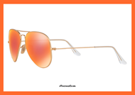 Occhiale da sole RayBan RB3025 col. 112/4D polarizzato con montatura in metallo oro. Occhiale dalla classica forma a goccia in puro stile aviator. Occhiale da sole RayBan aviator con lenti polarizzate in vetro marrone con specchio rosso effetto arancio. Accessorio unisex dallo stile casual e senza impegno.
