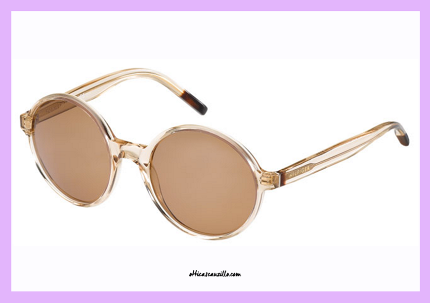 Sunglasses Tommy Hilfiger TH 1187S col. 7P4UT celluloid transparent. Glasses with plastic frames and lenses in beige tan. Let intrigued by this sunglasses from Tommy Hilfiger round shape. Female accessory in perfect vintage style with simple, clean lines.