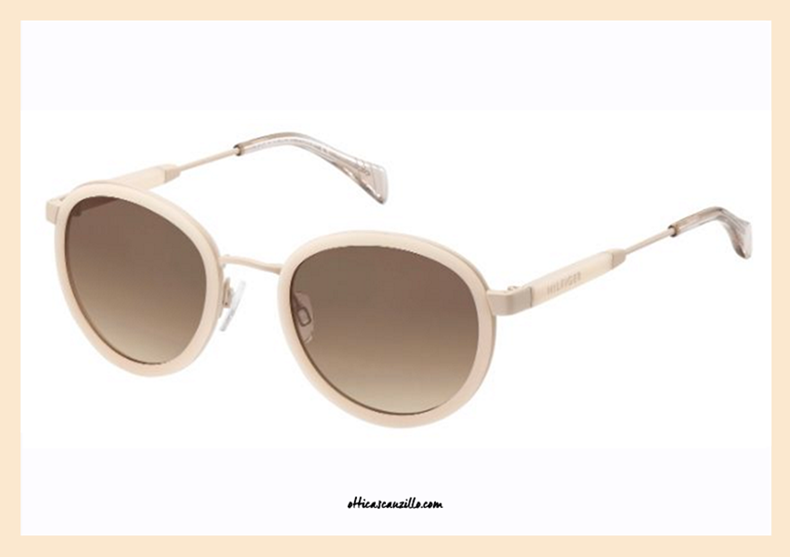 Sunglasses Tommy Hilfiger TH 1307S col. Z4KJD the perfect round shape. Eyewear Metal with celluloid colored milk and brown gradient lenses in contrast. Female accessory retro style suitable for anyone who is looking for a round sunglasses. Make It Yours, grab this sunglasses Tommy Hilfiger 1307!
