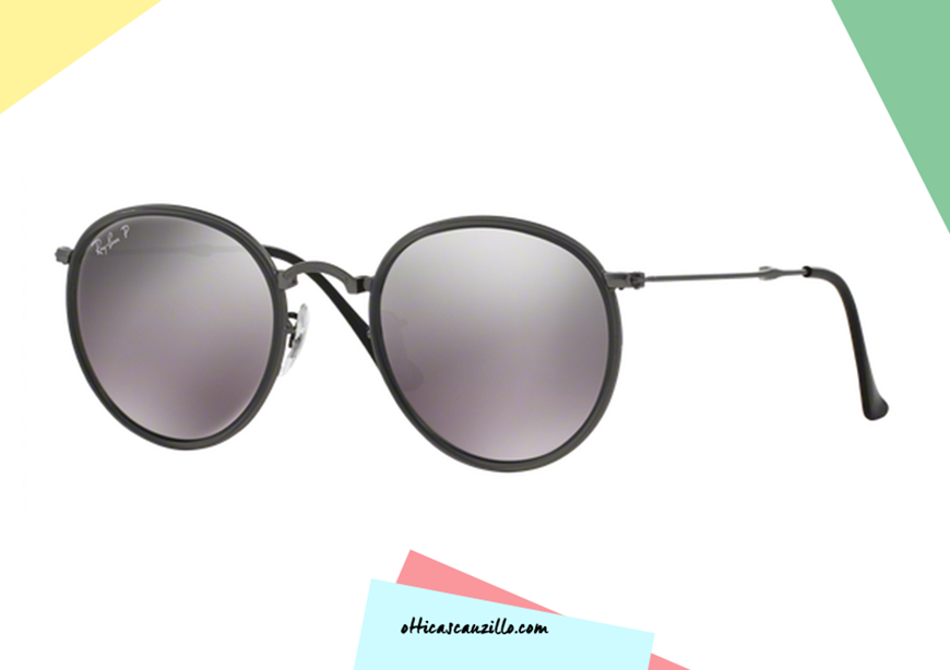RayBan sunglasses RB3517 Round col. 029 / N8 polarized. RayBan sunglasses collapsible metal gunmetal gray color with border shimmed and glass lenses polarized gray mirror. Buy your sunglasses RayBan 3517, give yourself an accessory from vintage and contemporary style.