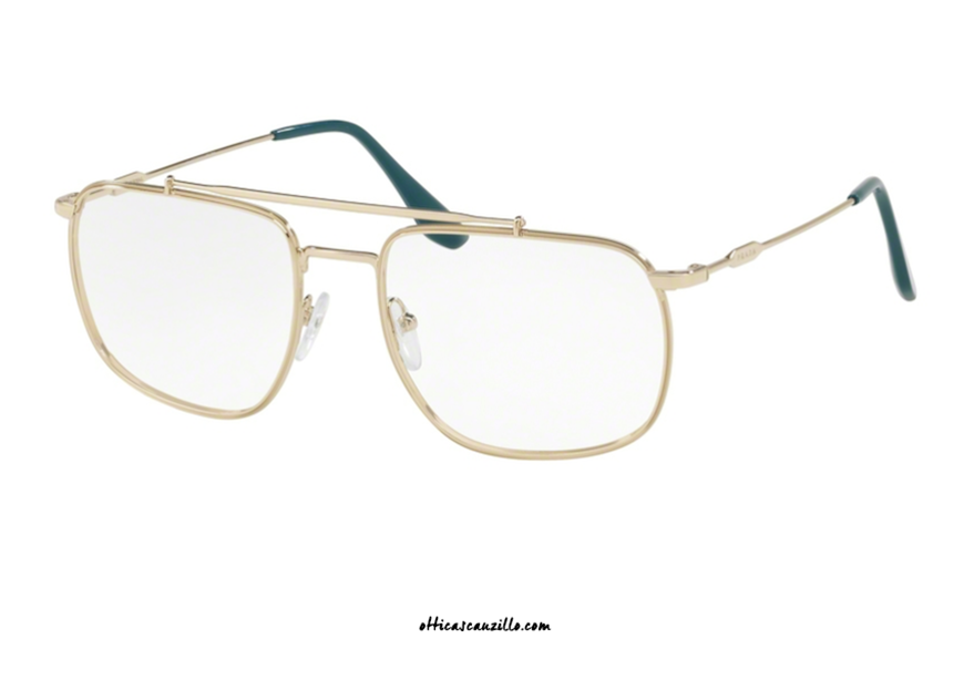 Eyeglasses Prada Journal PR 56UV col. ZVN1O1.  Ultra slim metal frame with double deck square front, in pale gold finish. Engraved Prada logo on the rods with green acetate terminals. Distinguish from the mass. Buy your Prada Journal PR 56UV eyeglasses online.