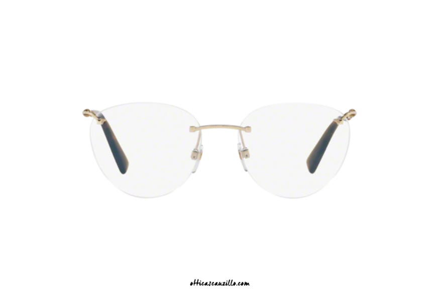 Eyeglasses Valentino VA1008 col. 3003. Gold metal bridge and temples with black terminals with applied studs. This Valentino VA1008 eyewear, thanks to the absence of the frame, will surprise you with its lightness and comfort of wearing. Buy it now.