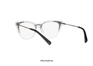 Eyeglasses Valentino VA3019 col. 5070. Transparent celluloid and two-tone gunmetal-black metal Valentino eyewear with decorative metal studs on the ends of the temples. Buy your Valentino VA3019 eyeglasses now, let yourself be inspired by its modern design.