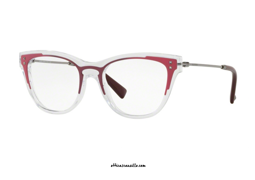 Eyeglasses Valentino VA3019 col. 5074. Transparent celluloid and two-tone violet-matte pink metal Valentino eyewear with decorative metal studs on the ends of the temples. Buy your Valentino VA3019 eyeglasses now, let yourself be inspired by its modern design.