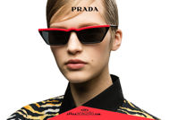 Acquista online su otticascauzillo.com il tuo nuovo occhiale da sole rettangolare stretto acetato PRADA SPR 19U col. nero + rosso