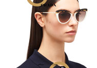 Acquista online su otticascauzillo.com il tuo nuovo occhialeda sole cat eye oversize acetato PRADA SPR 25X col. colore bianco + tartaruga media + nero