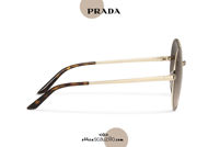 Acquista online su otticascauzillo.com il tuo nuovo occhiale da sole tondo metallo PRADA SPR 59X col. cacao + oro pallido