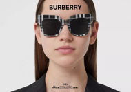 Acquista online su otticascauzillo.com il tuo nuovo occhiale da sole in bio-acetato con montatura squadrata e motivo tartan BURBERRY OBE4364 col. nero bianco.