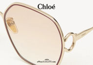 Acquista online su otticascauzillo.com il tuo nuovo occhiale da sole a squadrati metallo Petite Austine Chloè col. 0146 oro e burgundy