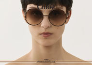 Acquista online su otticascauzillo.com il tuo nuovo occhiale da sole tondo metallo Celeste Chloè col. 0144 marrone e oro