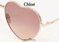 Acquista online su otticascauzillo.com il tuo nuovo occhiale da sole a cuore in metallo Milane Chloè col. 0071 gold red/orange
